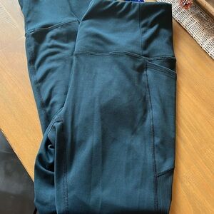 Women’s RBX medium dark teal green pocketed legging with cuffed ankle